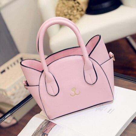 Pink faux leather women's crossbody, a cute cat bag and playful accessory for everyday feline style.
