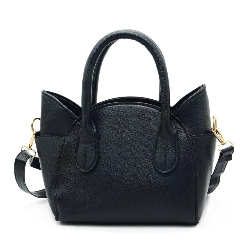 Versatile silver women's cat accent shoulder bag, a fashionable faux leather everyday purse.