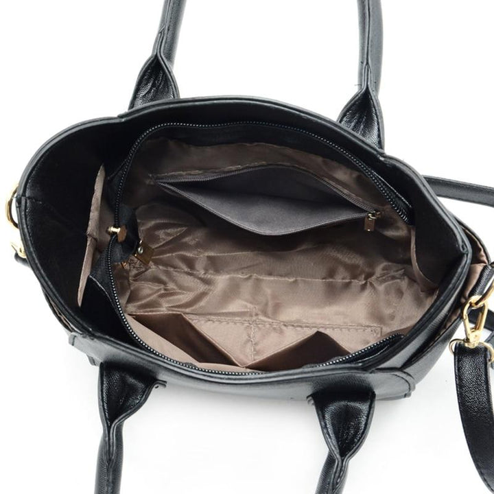 Cute women's cat accent purse for everyday, a black faux leather shoulder bag with feline charm.