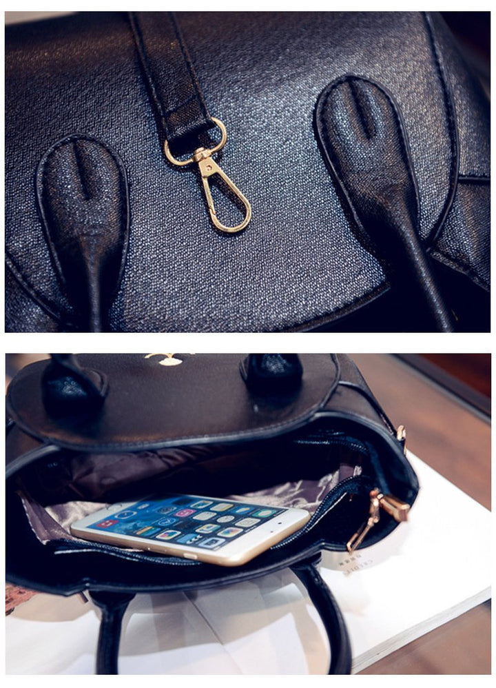 CatWalk™ women's cat bag, a stylish blue faux leather crossbody for playful feline fashion.