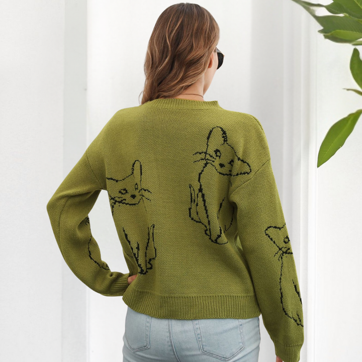 Trendy women's long sleeve pullover sweater with a playful cat graphic, perfect for autumn casual fashion.