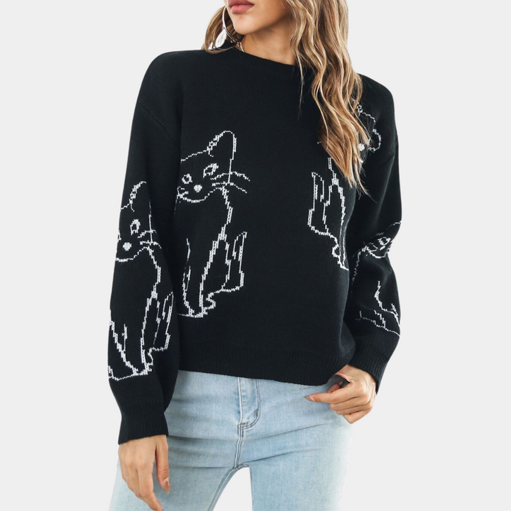 Stylish women's graphic cat print pullover sweater, ideal for trendy winter fashion and cozy casual wear.