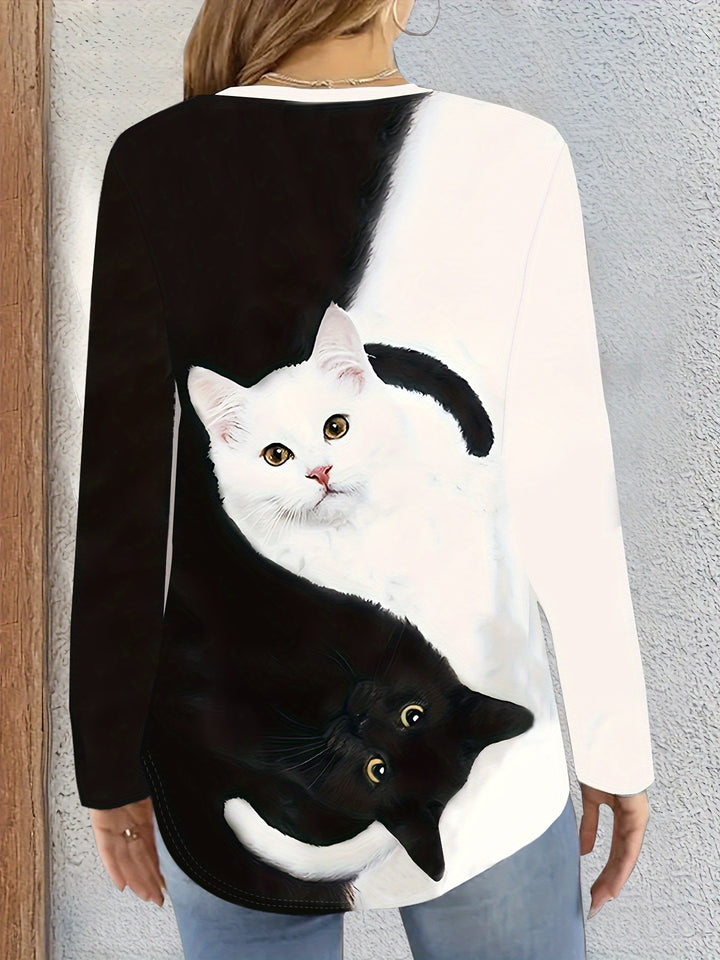 Comfortable women's long sleeve tee featuring a playful cat graphic and stylish color block design. Ideal for autumn style.