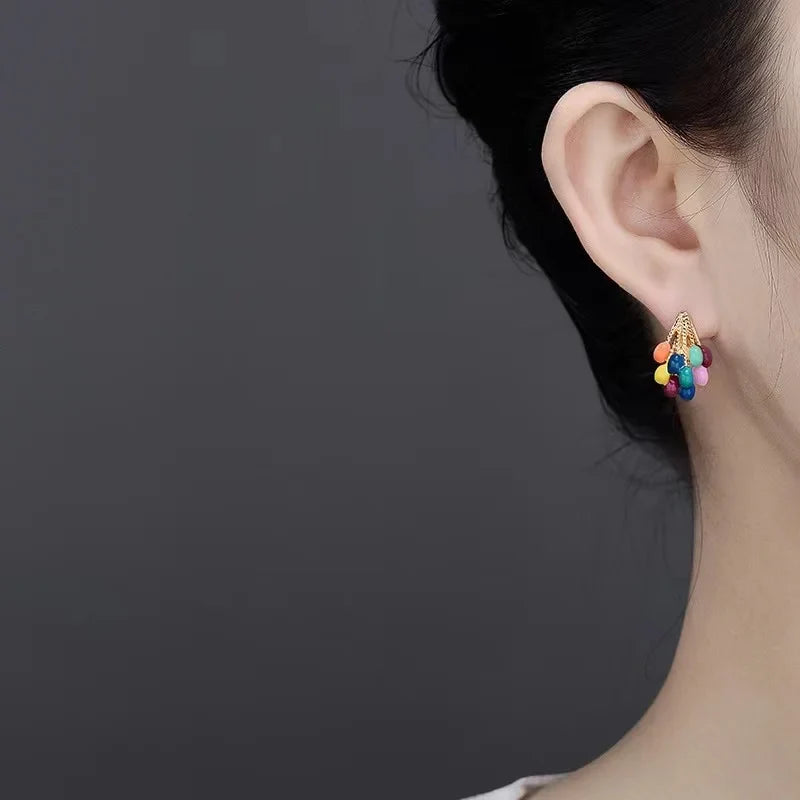 Fashionable women's stud earrings: multicolor enamel balloon design, gold-tone. Playful and charming jewelry accessory.