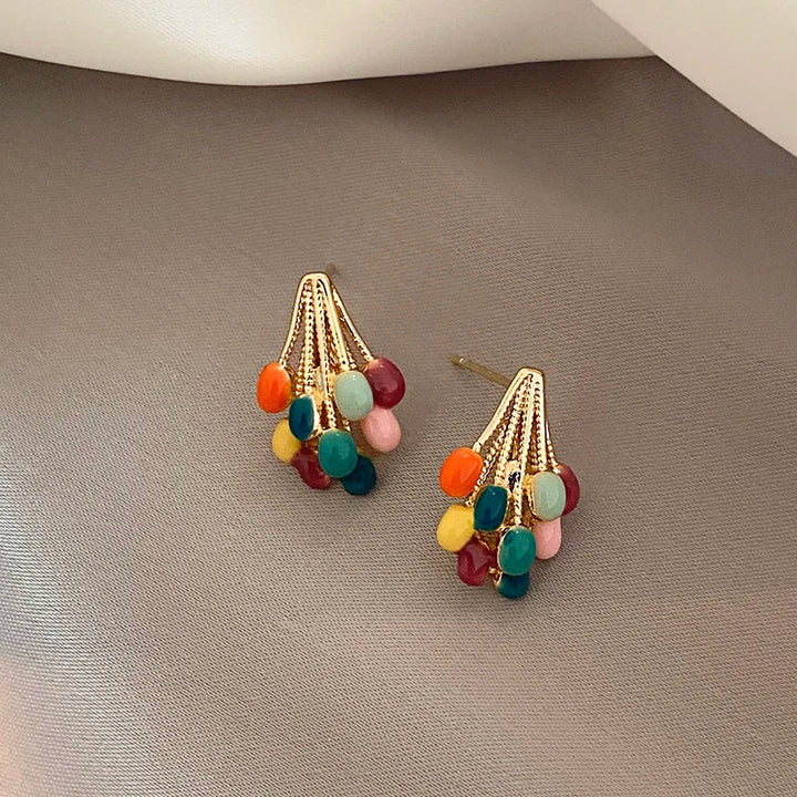 Bright gold-tone stud earrings with playful multicolor enamel balloon details, perfect for women's jewelry collection.
