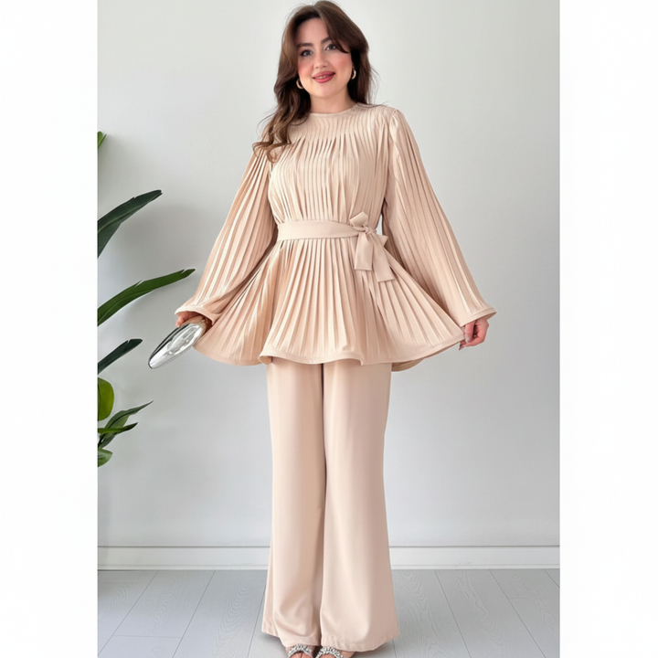 Close-up of pleated detail on women's blouse from 'Kerstin' lounge set.