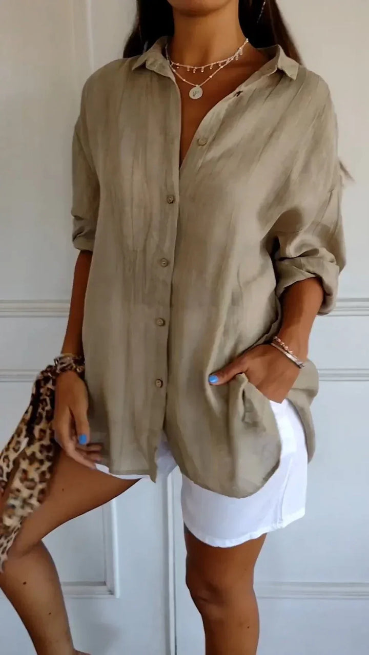 Women's lightweight blouse, featuring subtle pleats. A comfortable, stylish spring/summer top.