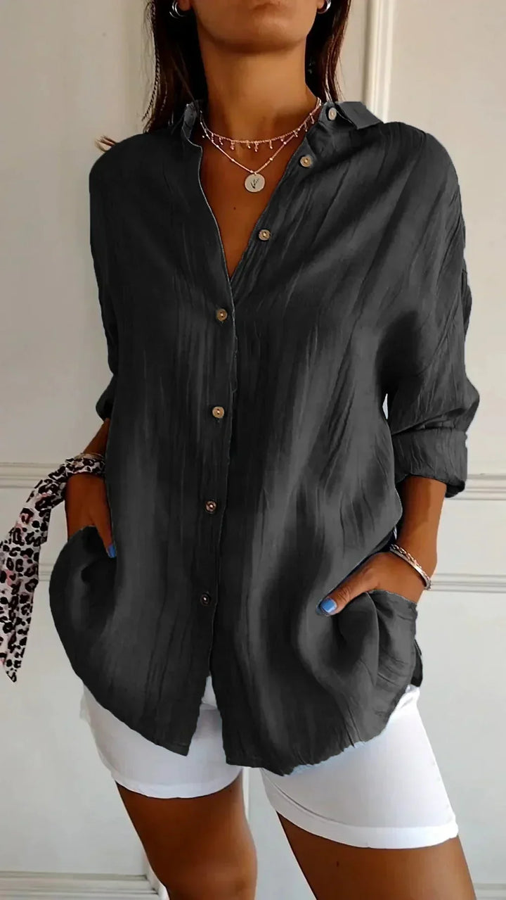 Chic women's Elodie pleated blouse. Comfortable & versatile lightweight top for spring & everyday style.