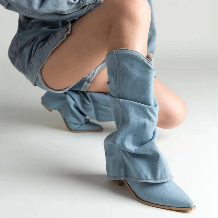 Slip-on tall pleated boots for women, featuring a sharp pointed toe and stable block heel.