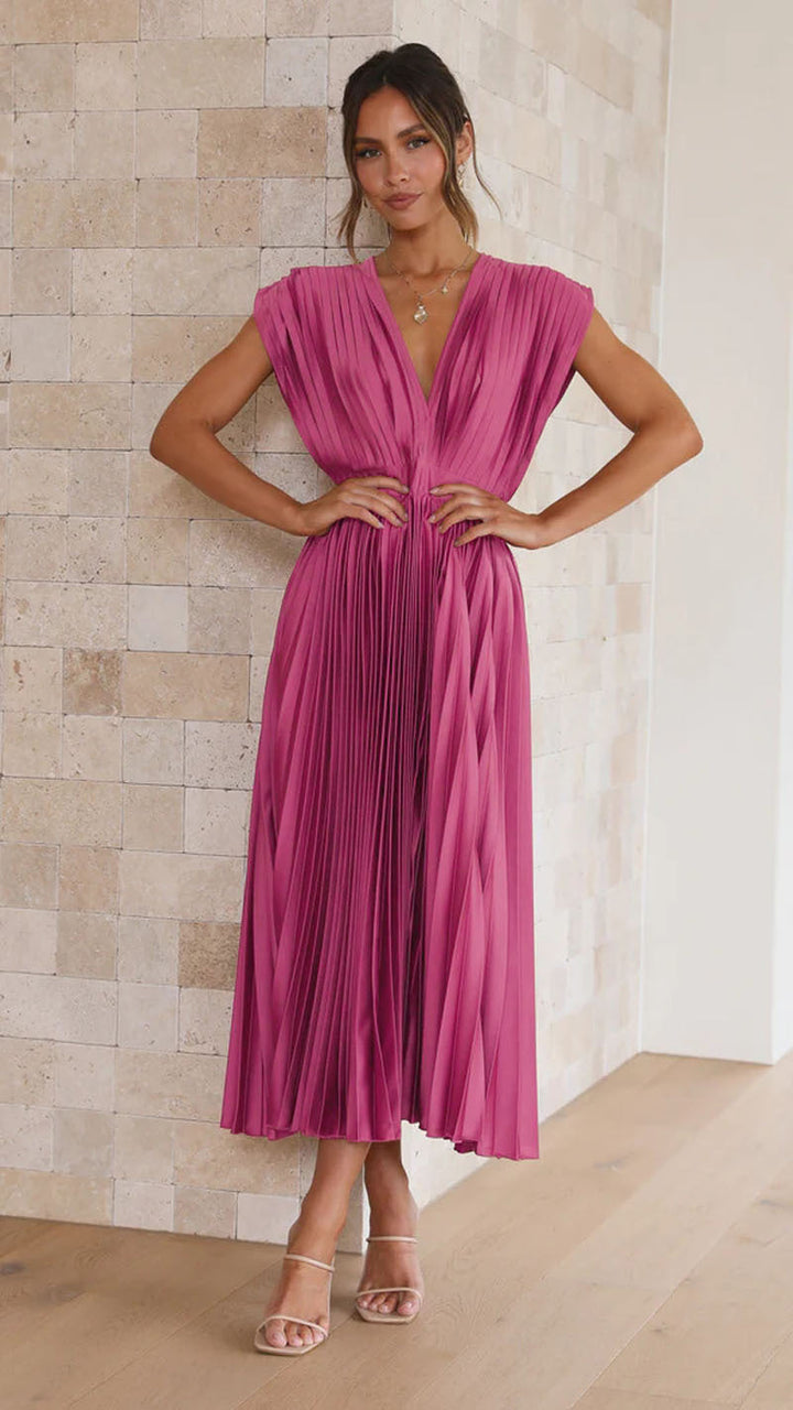 Elegant women's pleated midi dress with flattering V-neck, suitable for summer casual or evening.