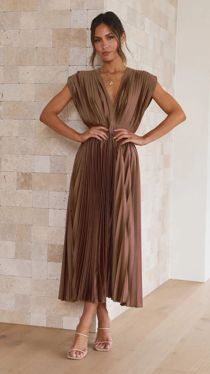 Chic pleated V-neck midi dress for women, showcasing effortless style for summer or party fashion.