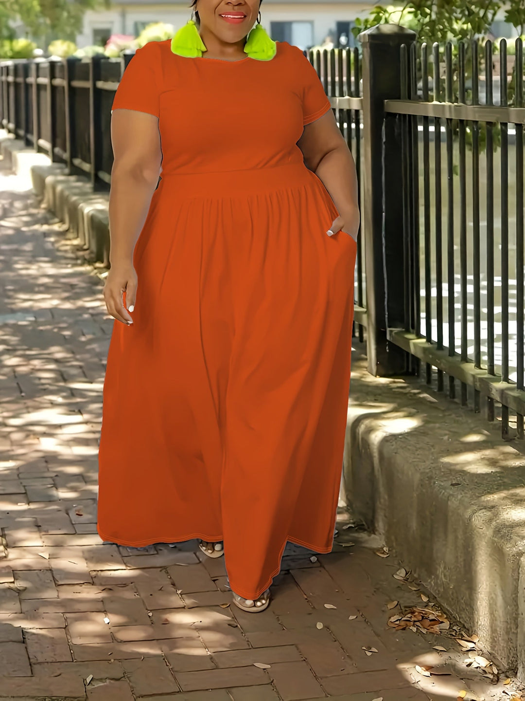 Comfortable women's plus size flowy maxi dress with short sleeves, perfect for summer elegance.