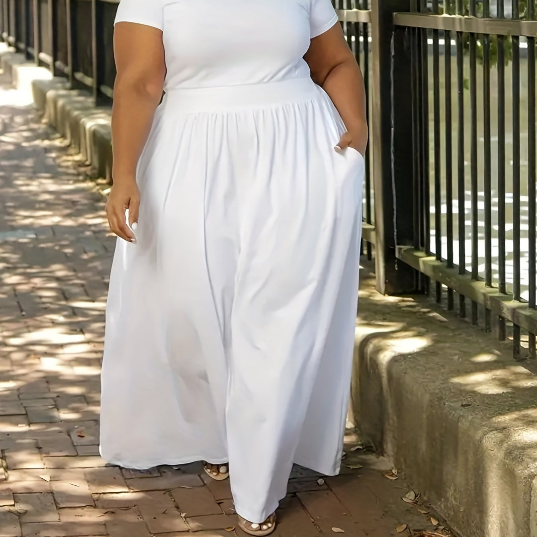 Women's plus size short sleeve flowy maxi dress. Chic and comfortable for elegant summer events.