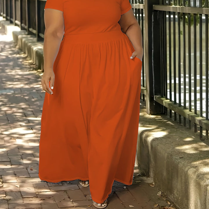 Versatile plus size flowy maxi dress for women, short sleeve. Comfortable for summer, elegant look.