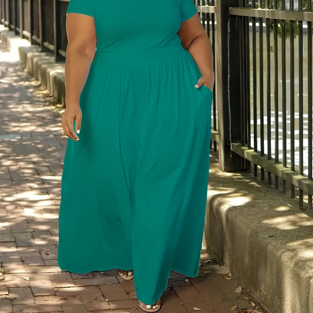 Elegant women's plus size short sleeve flowy maxi dress, designed for comfortable summer wear.