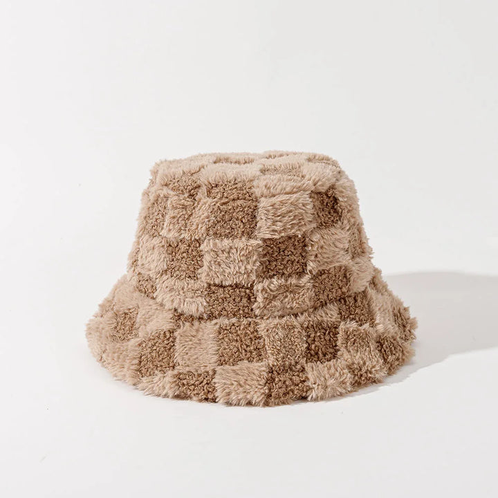 Women's plush checkerboard bucket hat, cozy & stylish winter accessory.