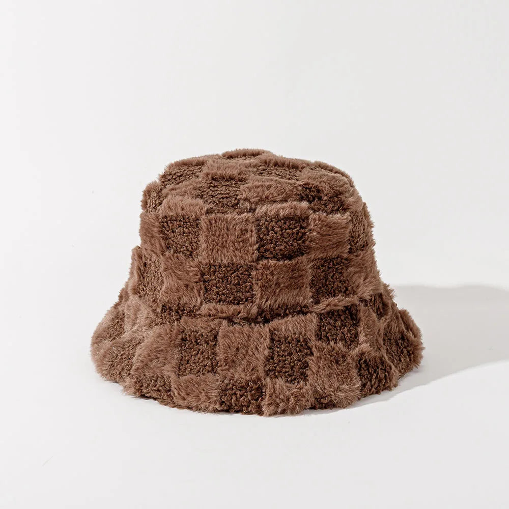 Trendy women's plush checkerboard bucket hat, perfect warm fashion accessory for winter.