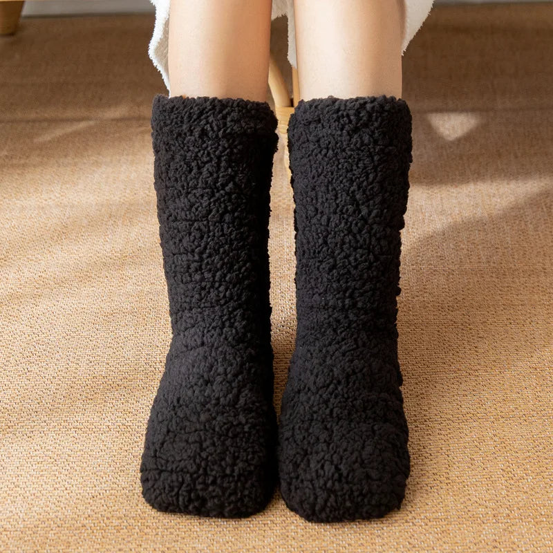 Stay warm with these cozy plush women's winter socks. Mid-calf, no-slip design ensures ultimate foot comfort; a great gift.
