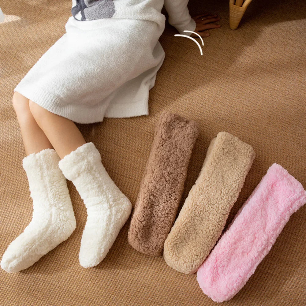 Soft plush women's winter socks. Cozy, warm mid-calf design ensures ultimate foot comfort & no-slip wear.