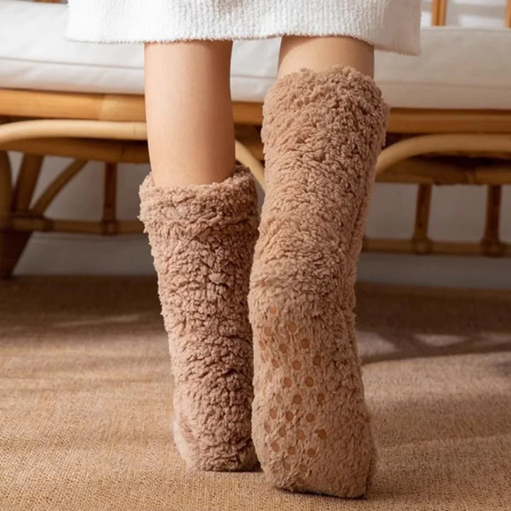 Ultimate warmth with these cozy plush women's winter socks. Mid-calf, no-slip design for superior foot comfort.