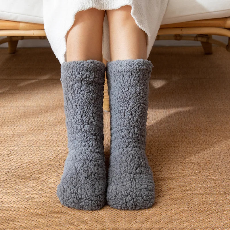 Cozy plush women's winter socks, a warm & comfortable mid-calf gift idea. Features no-slip design for foot comfort.