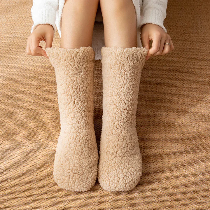Women's plush mid-calf winter socks. Cozy, warm, and no-slip for ultimate foot comfort. A great gift.