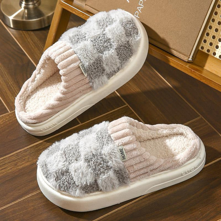 Gray women's comfort slippers, soft plush indoor footwear for relaxing at home. Ideal casual house shoes.