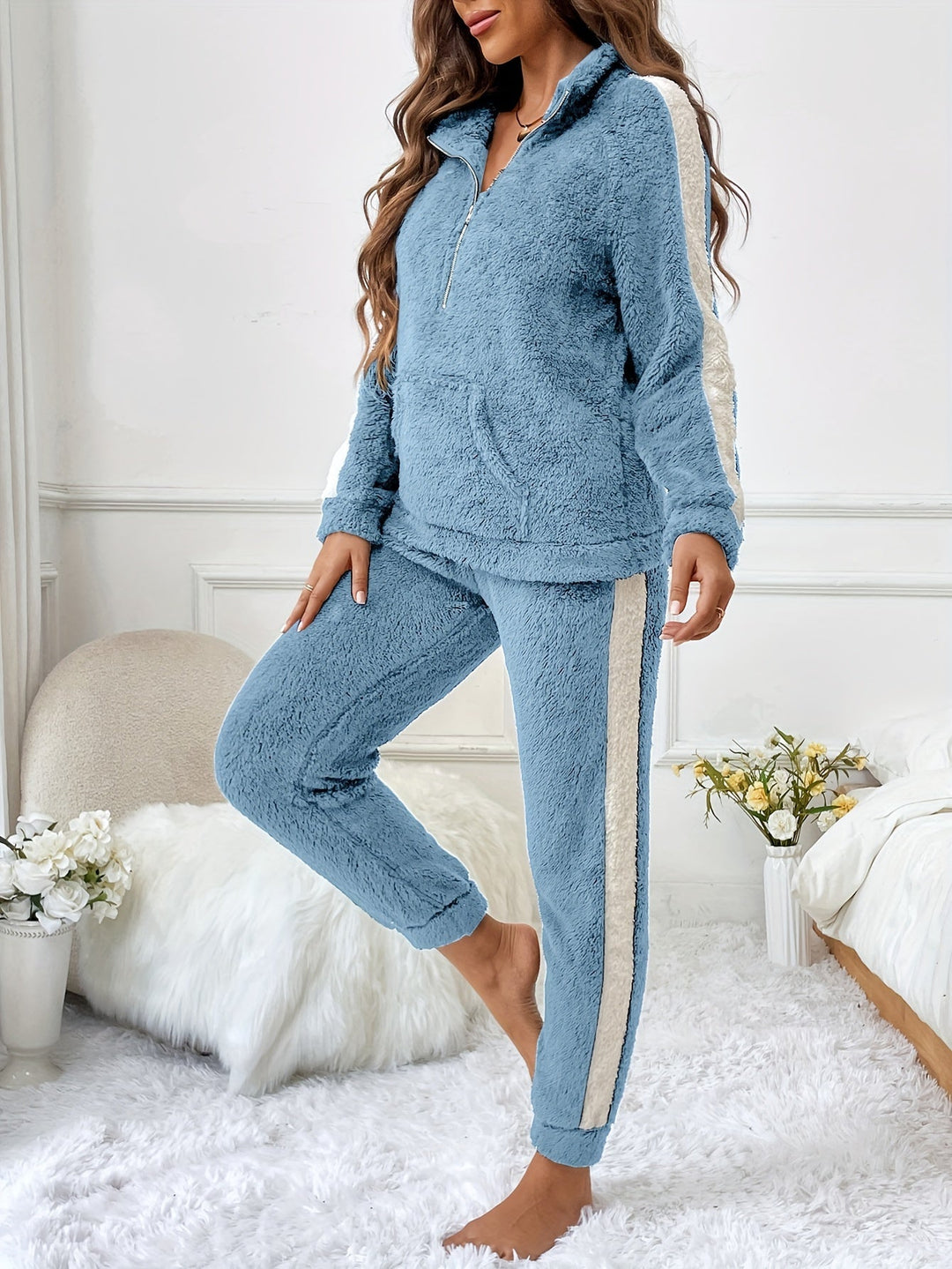 Women's plush lounge pajama set, super soft & cozy for winter comfort at home.