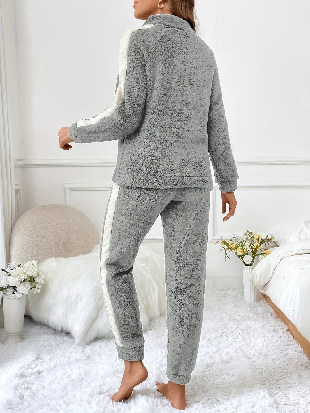 Warm women's plush lounge set, half-zip top & joggers, ultimate cozy winter sleepwear.