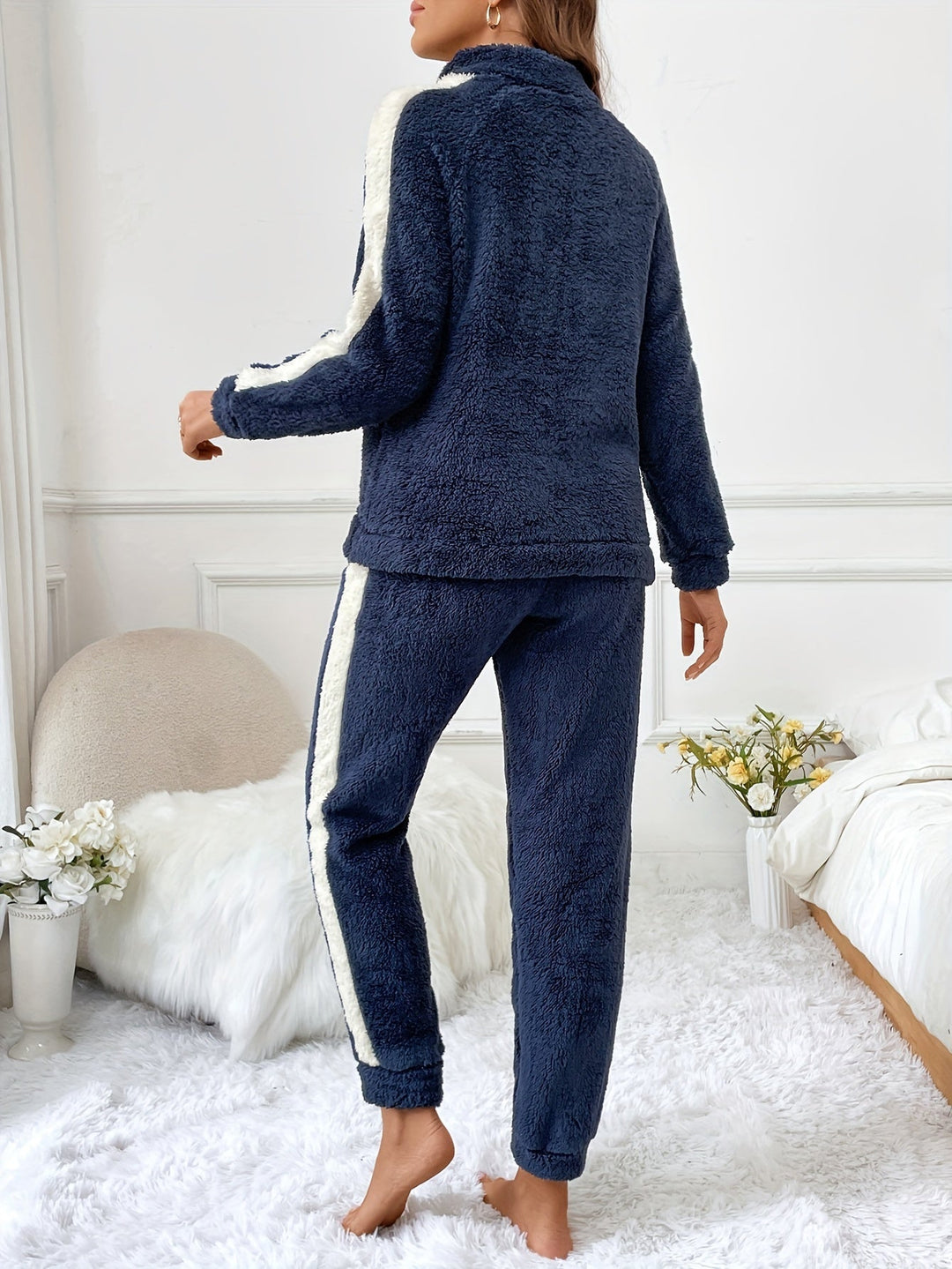 Lyra women's plush pajama set, half-zip top & joggers, comfy & stylish loungewear.