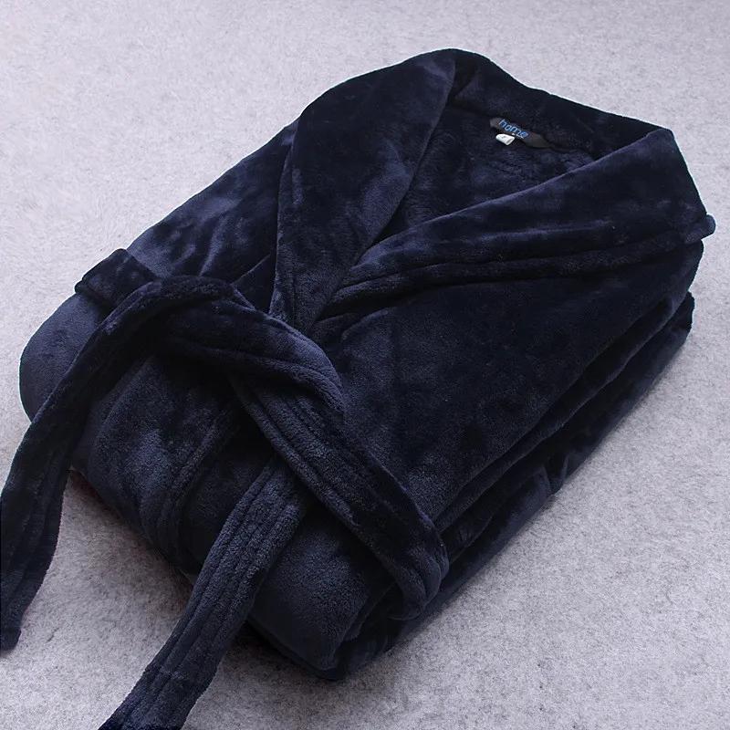 Warm women's plush winter robe, featuring belt & pockets for ultimate coziness.