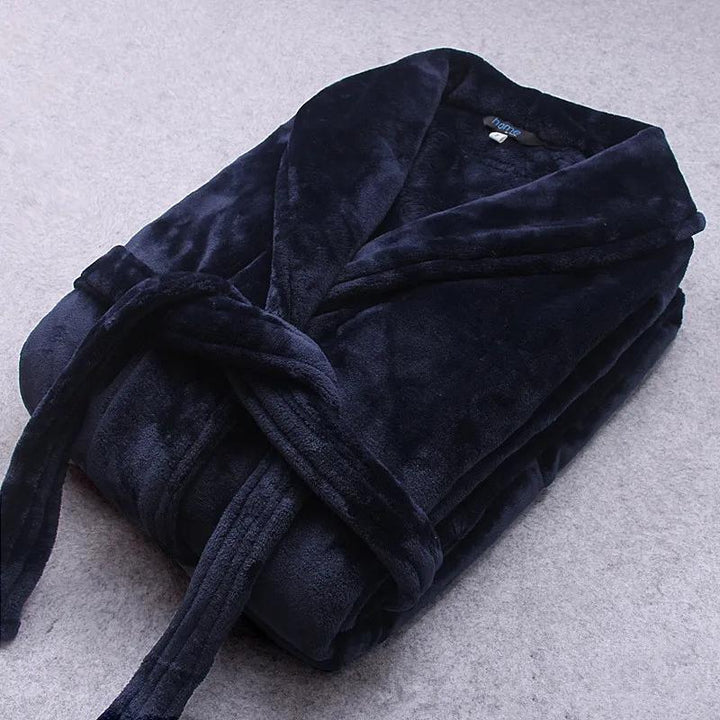 Warm women's plush winter robe, featuring belt & pockets for ultimate coziness.