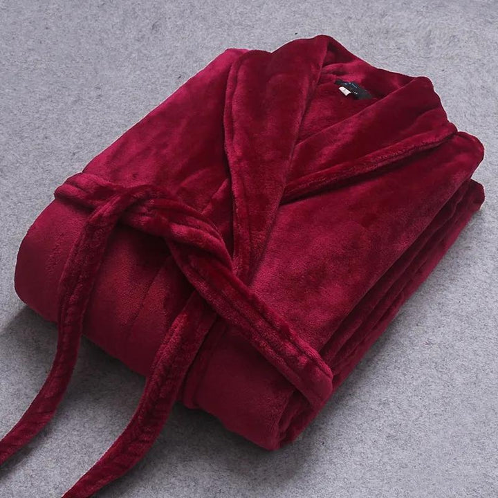 Fluffy women's winter bathrobe, soft plush fabric with a tie belt and pockets.
