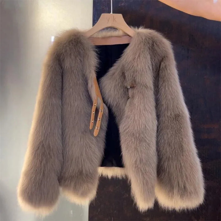Cozy women's plush winter coat, ideal layering piece for everyday comfort & chic cold weather fashion.