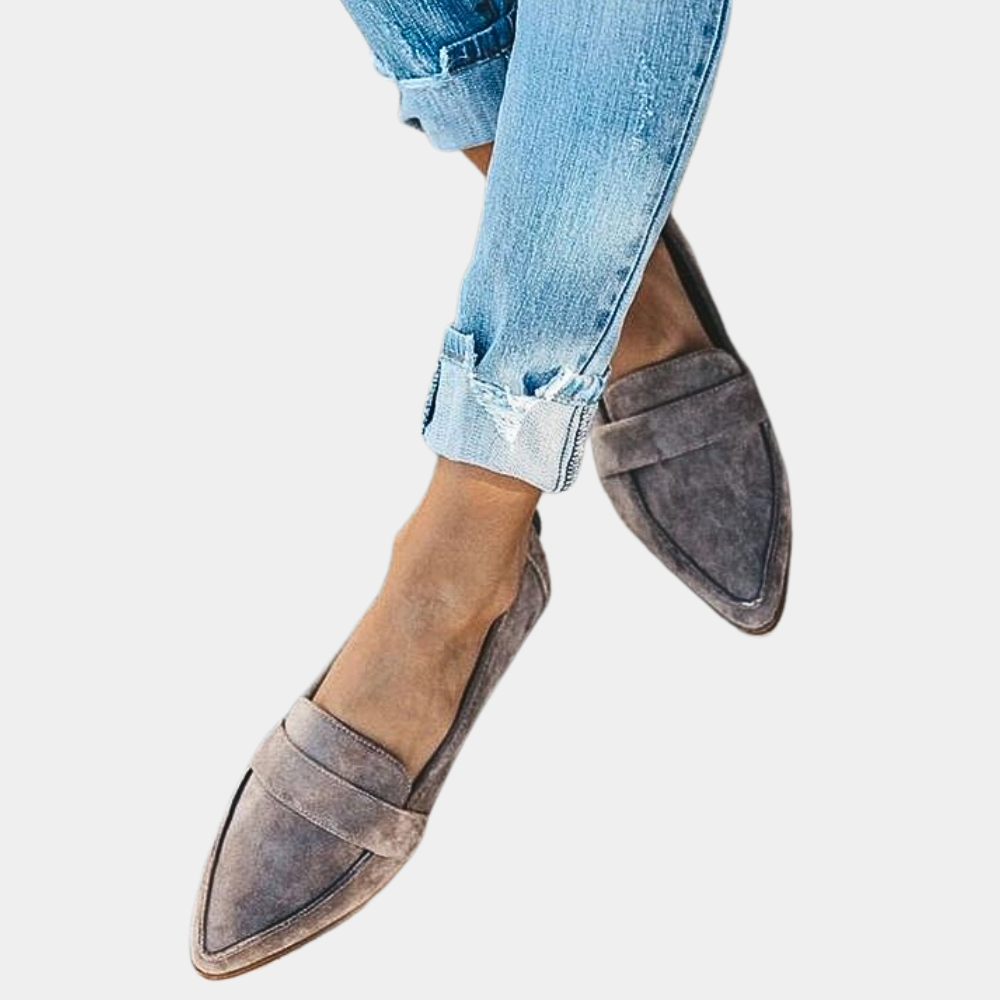 Women's pointed-toe slip-on loafers, perfect for office wear or elegant casual outfits.