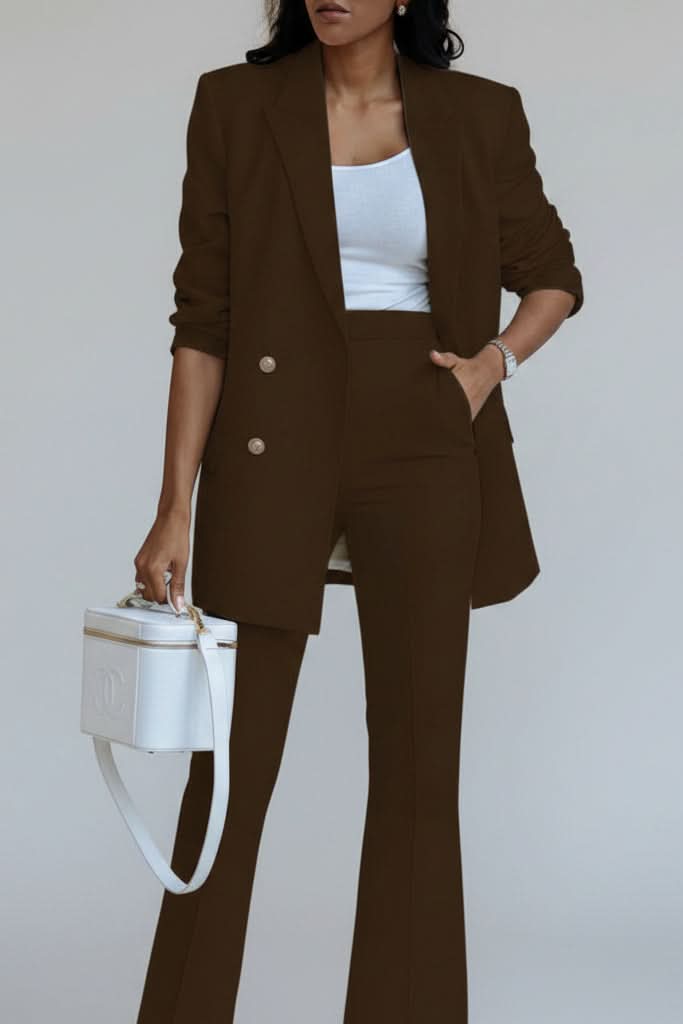 Tailored women's trouser suit with a polished blazer, suitable for business and events.