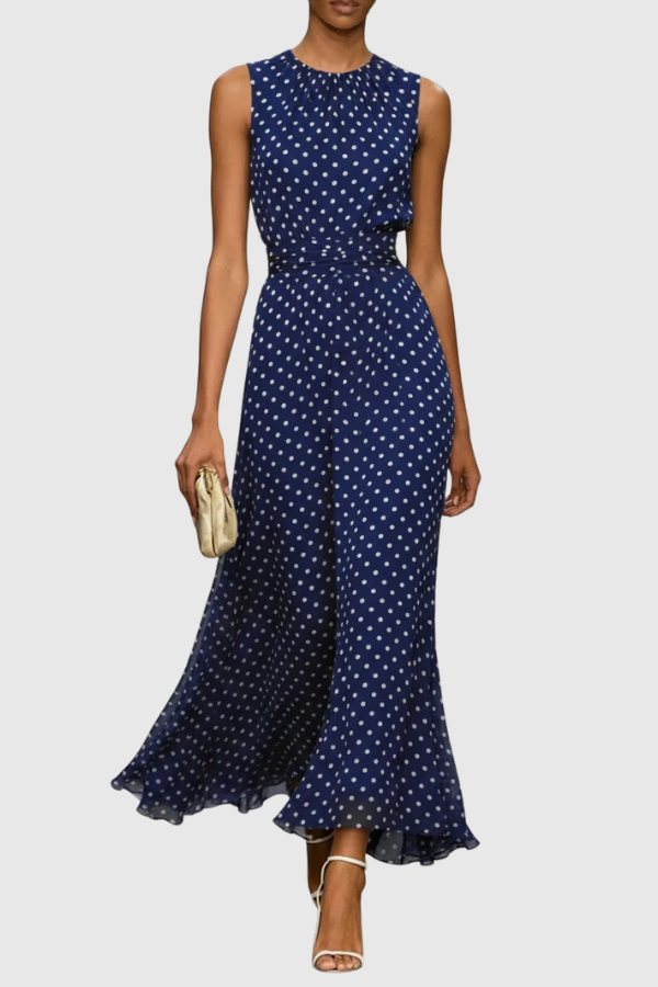 Women's sleeveless polka dot maxi dress. Halter neck and keyhole detail. Perfect casual or elegant summer vacation dress.