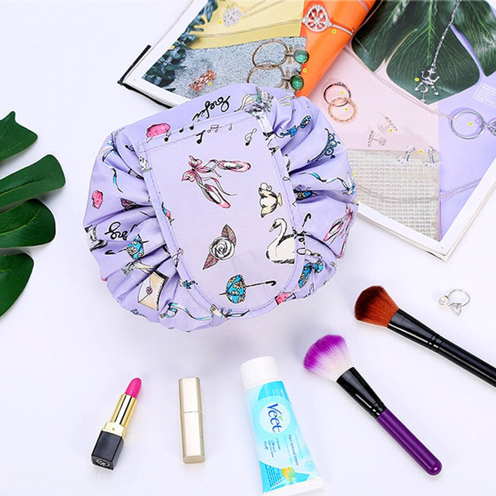 Open drawstring cosmetic bag showing organized makeup & toiletries. Ideal portable travel accessory.