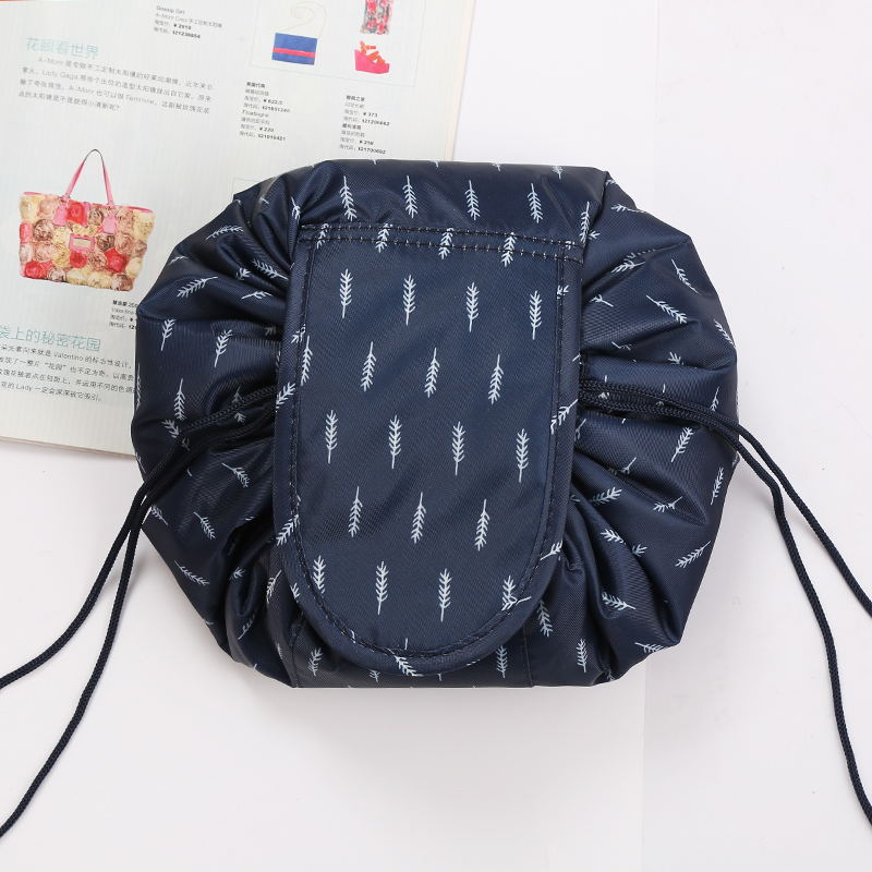 Women's grey flamingo drawstring bag, perfect for organizing cosmetics & toiletries on the go.