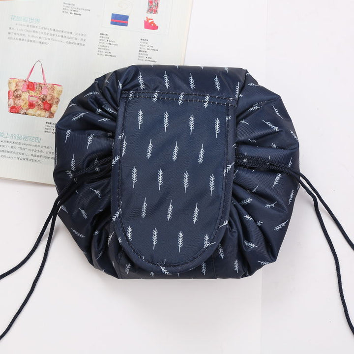 Women's grey flamingo drawstring bag, perfect for organizing cosmetics & toiletries on the go.