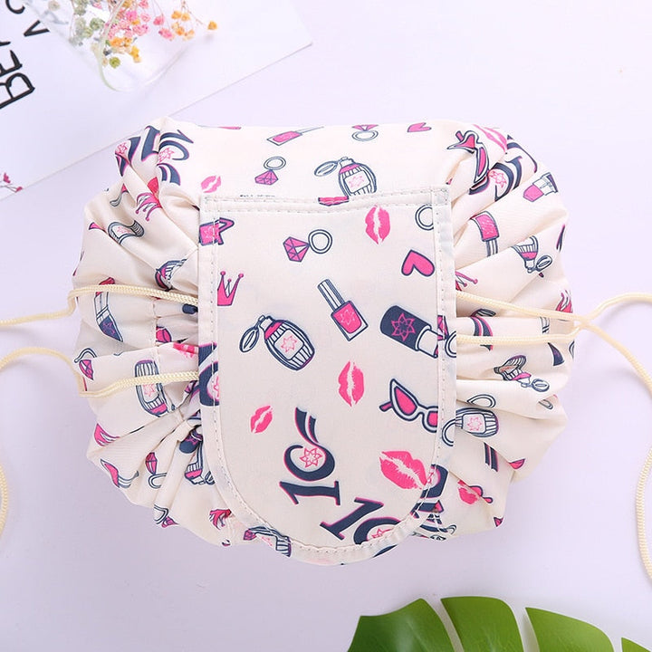 Portable travel organizer bag for women's beauty products. Waterproof drawstring cosmetic pouch.