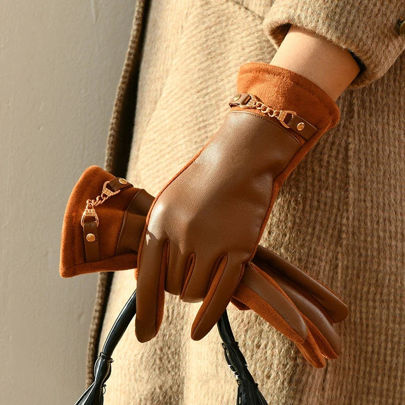 Warm women's genuine leather gloves with luxurious cashmere lining, ideal for cold weather protection.