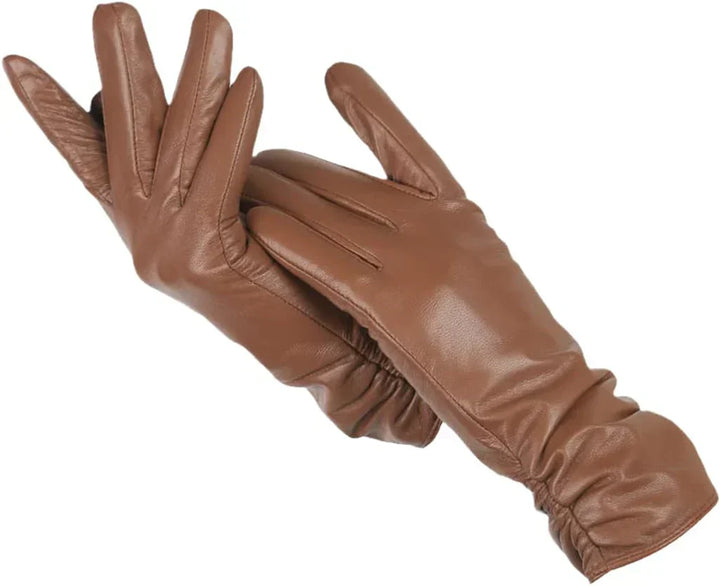 Close-up of soft black premium leather women's gloves with visible wool lining for fall/winter