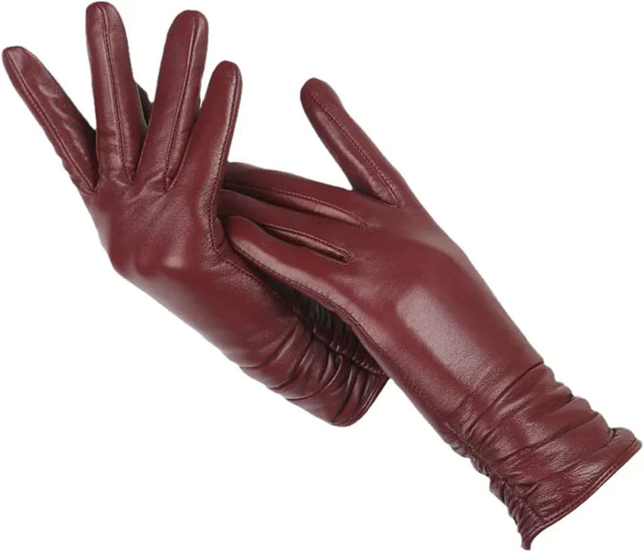 Elegant women's leather fashion gloves, wool-lined, perfect for keeping hands warm in autumn