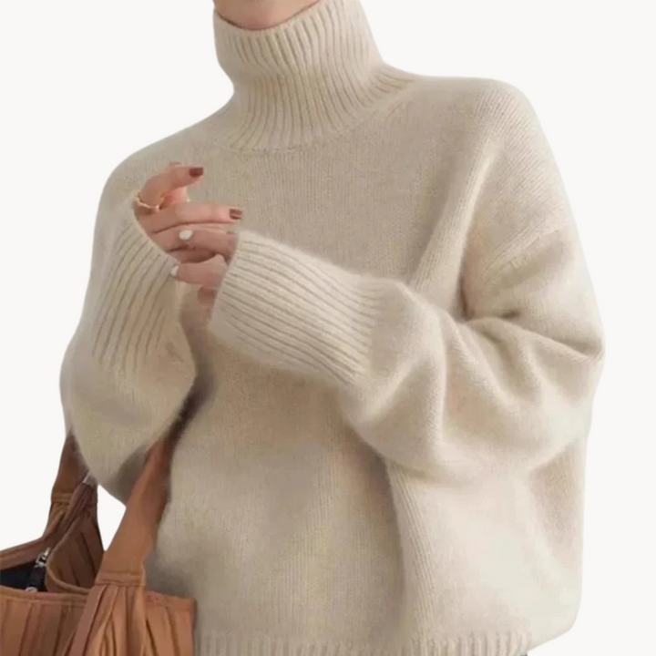 Women's premium cozy knit turtleneck sweater for winter fashion and comfort. Soft, versatile knitwear.