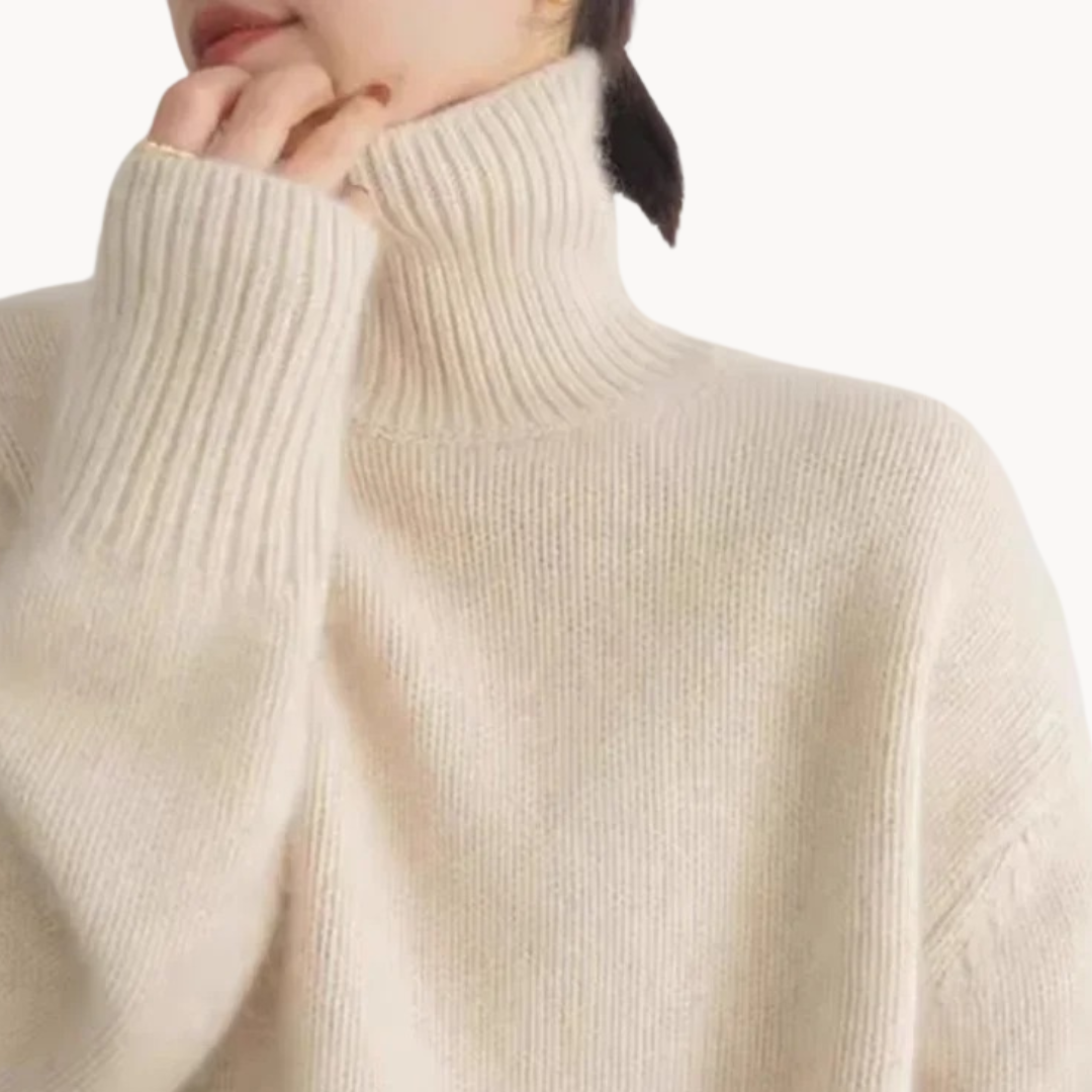 Luxuriously soft knit women's turtleneck sweater, perfect for cozy winter fashion & ultimate comfort.