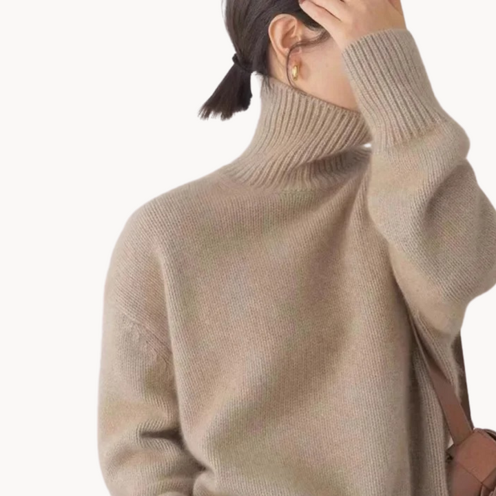 Premium women's cozy knit turtleneck sweater. High-quality knitwear offering luxurious comfort & winter style.