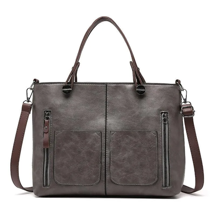 Durable women's leather handbag, featuring genuine leather craftsmanship for an elegant look.