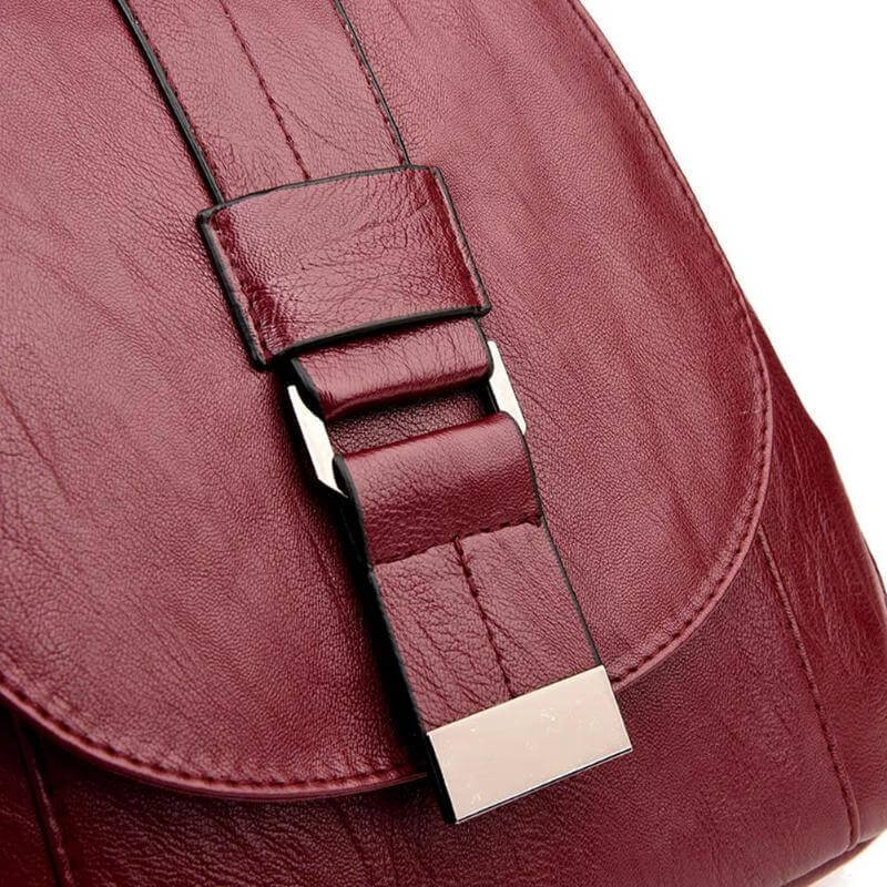 Travel-friendly water-resistant leather backpack for women, featuring anti-theft design.