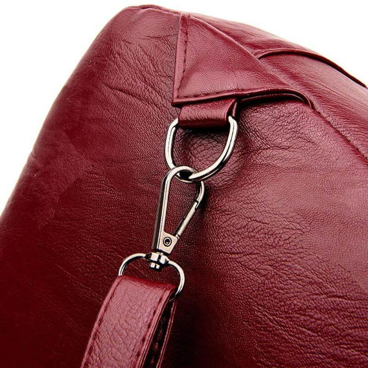 Fashionable water-resistant genuine leather women's shoulder bag.